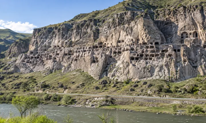 The cave openings of Vardzia stretch across a volcanic cliff above the Mtkvari valley The cave openings of Vardzia stretch across a volcanic cliff above the Mtkvari valley